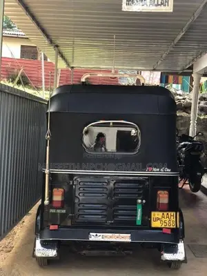 Bajaj RE 2014