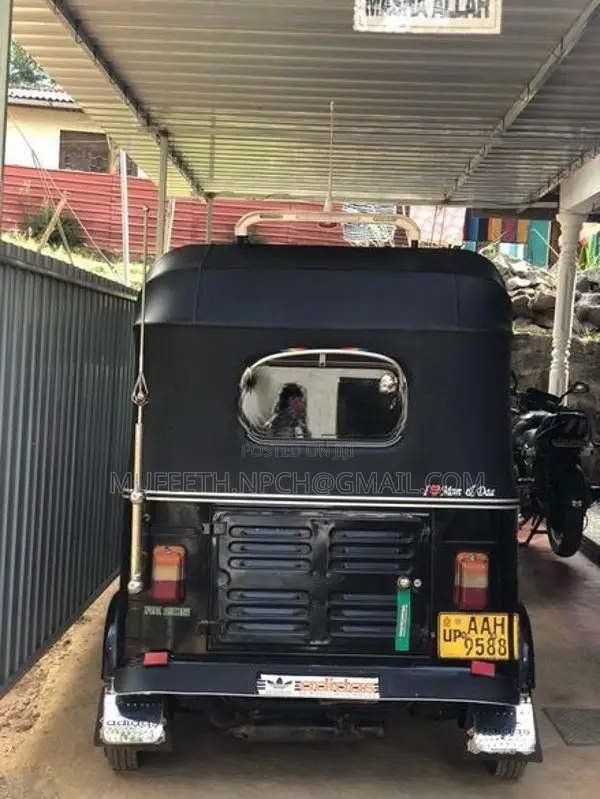 Bajaj RE 2014
