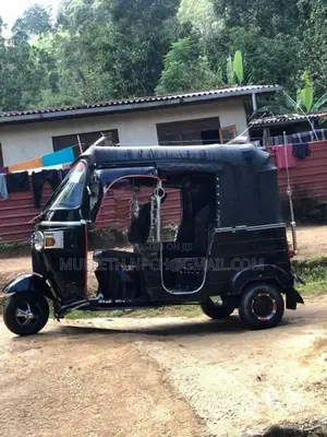 Bajaj RE 2014