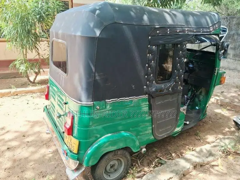 Bajaj RE 2013