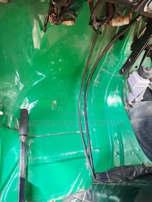 Bajaj RE 2013