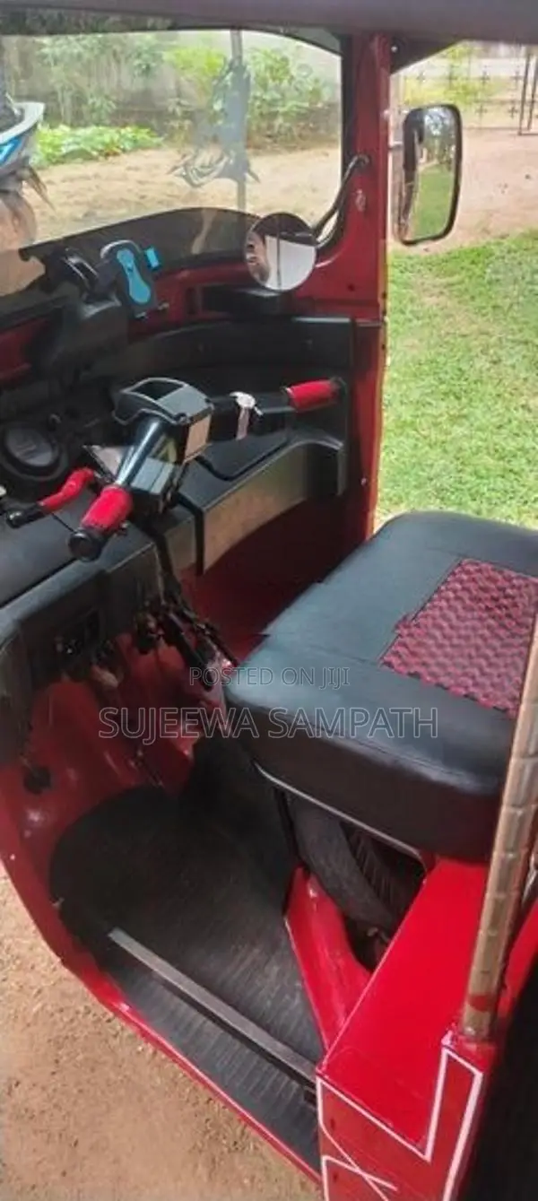 Bajaj RE 2014