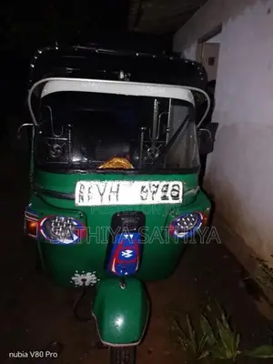Bajaj RE 2011