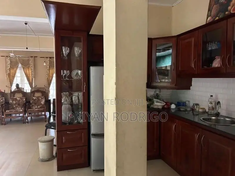 Gampaha - Hiripitiya Large Coconut Land with a House for Sale