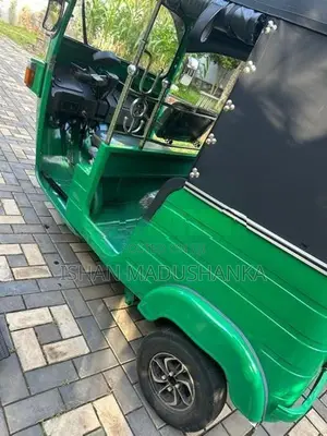 Bajaj RE 2013