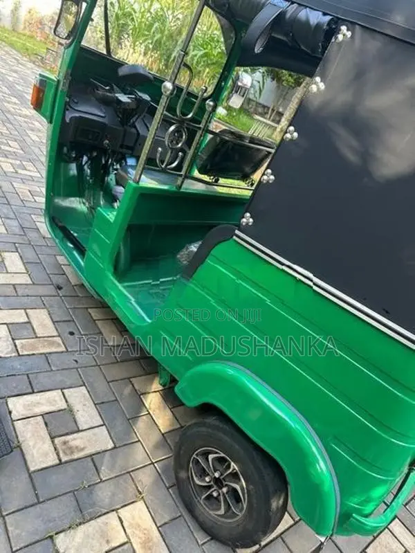 Bajaj RE 2013