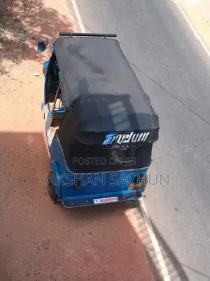 Bajaj RE 2013