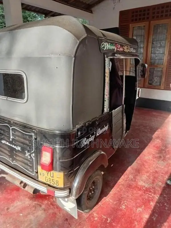 Bajaj RE 2011
