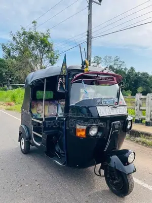 Bajaj RE 2011