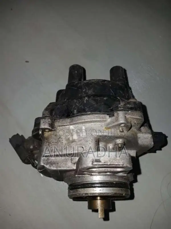 Used Nissan GA15DE distributor for sale. Part no. 22100-0M302. Sold wi