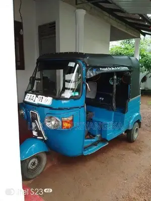 Bajaj RE 2013