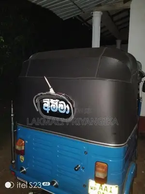 Bajaj RE 2013