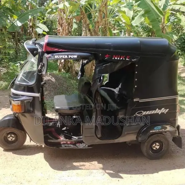 Bajaj RE AAE 2013