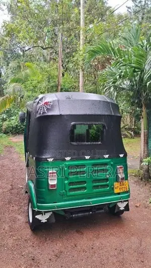 Bajaj RE 2014