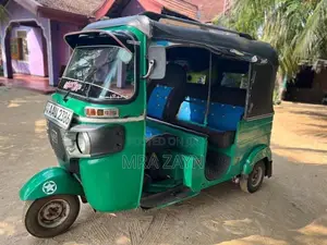 Bajaj RE 2014