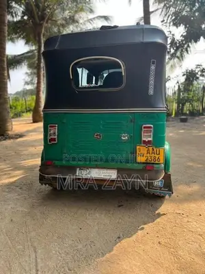 Bajaj RE 2014