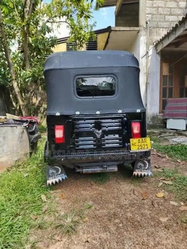Bajaj RE 205 2014