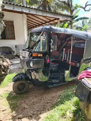 Bajaj RE 205 2014