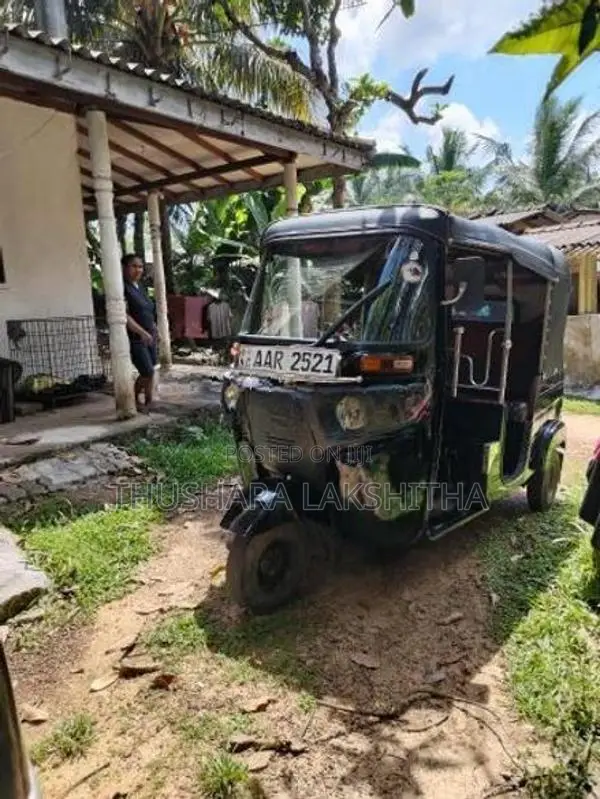 Bajaj RE 205 2014