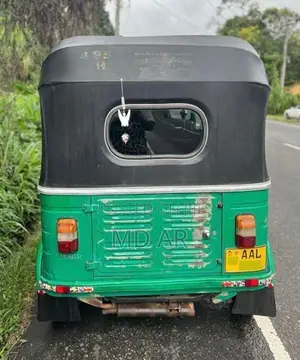 Bajaj RE 2013