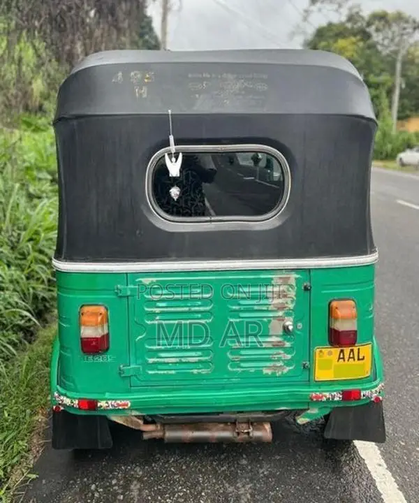 Bajaj RE 2013