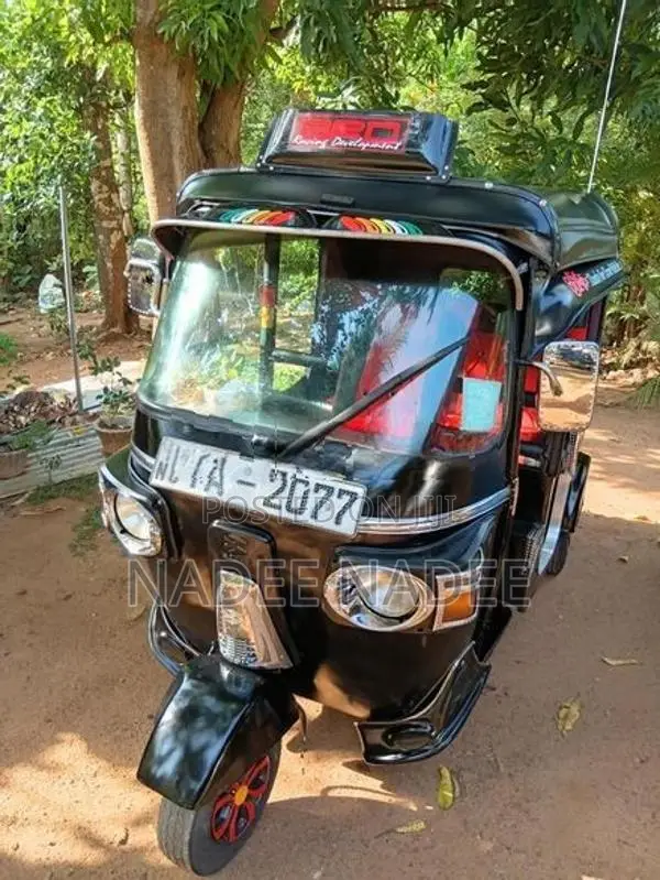 Bajaj RE 2011