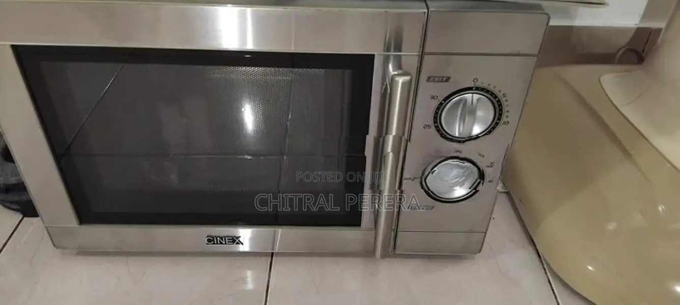Cinex Microwave Oven. IN . Brought