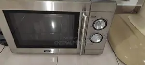 Cinex Microwave Oven. IN . Brought