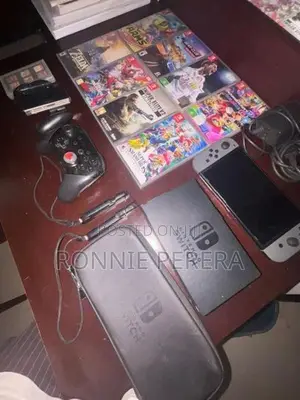 Nintendo Switch With All The Accessories + 9 Games