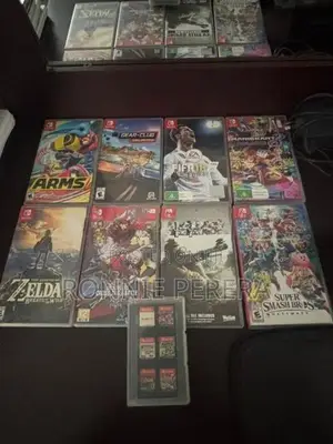 Nintendo Switch With All The Accessories + 9 Games