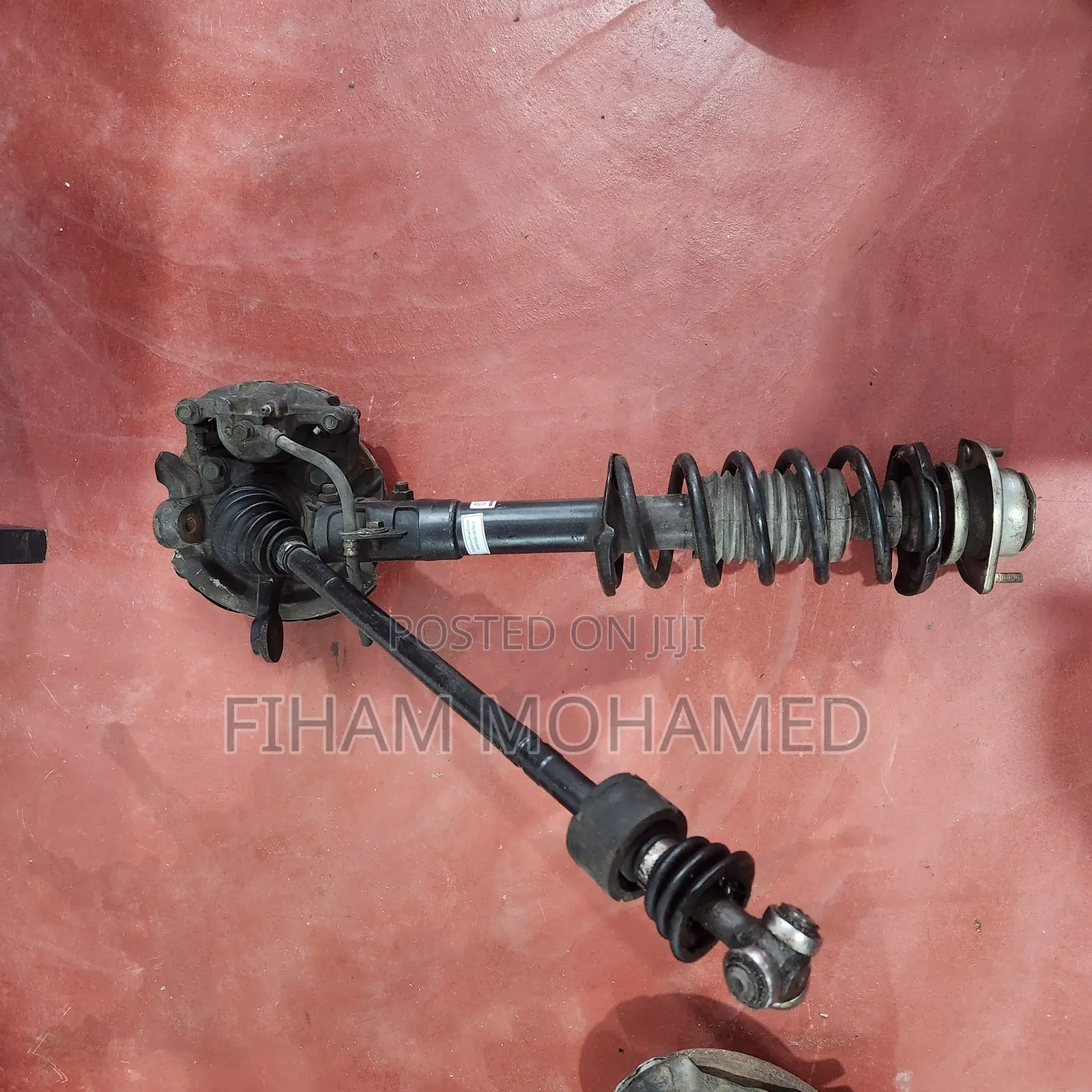 Daihatsu Mira Cocoa 2009 DBA-L675S Front Strut Assembly