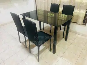 Glass Top Dining Table With 4 Cushion Chairs