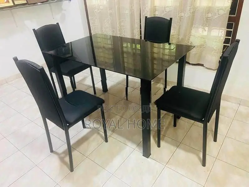 Glass Top Dining Table With 4 Cushion Chairs