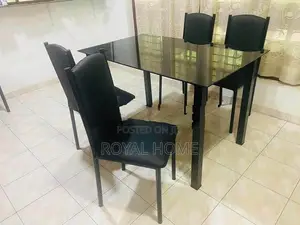 Glass Top Dining Table With 4 Cushion Chairs