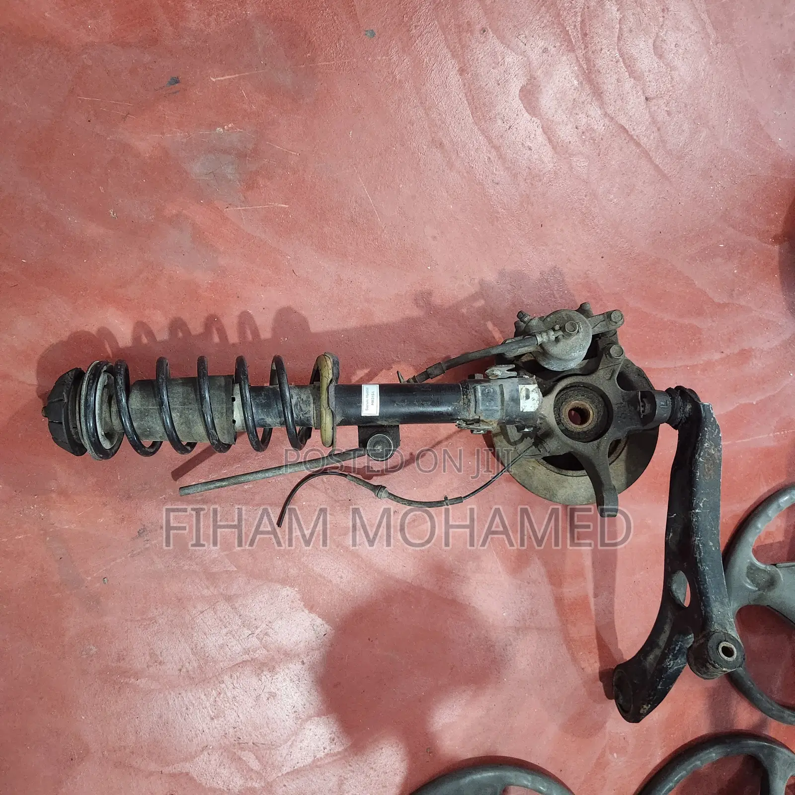 Suzuki Hustler MR31S Front Strut Assembly | Front Suspension