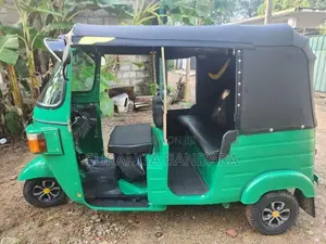 Bajaj RE 2013