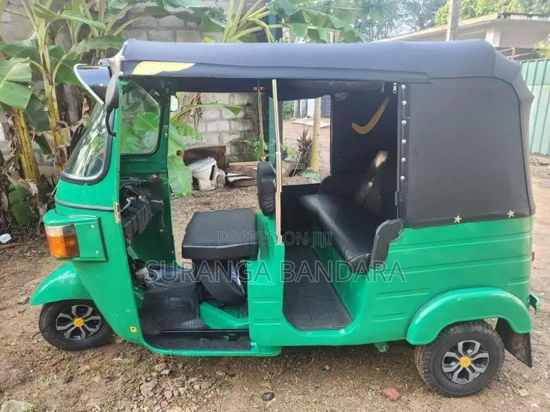 Bajaj RE 2013