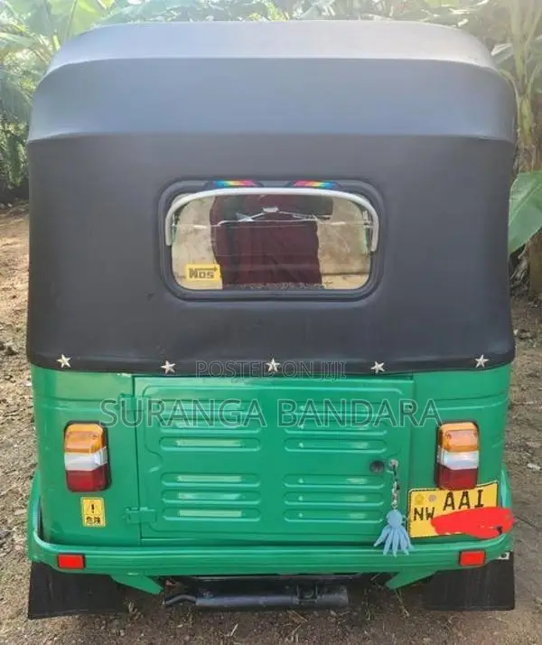Bajaj RE 2013