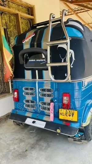 Bajaj RE 2015