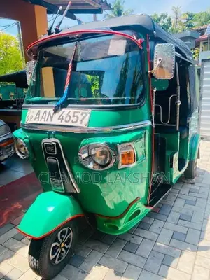 Bajaj RE 2013