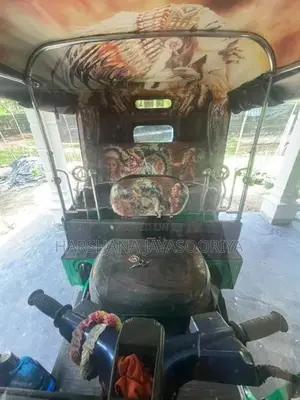 Bajaj RE 2014