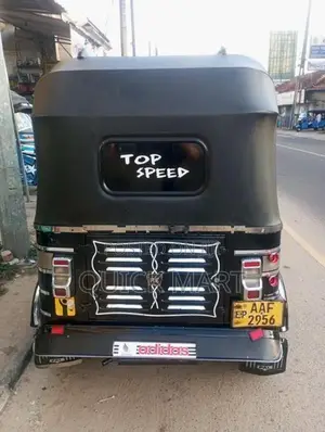 Bajaj RE 2014