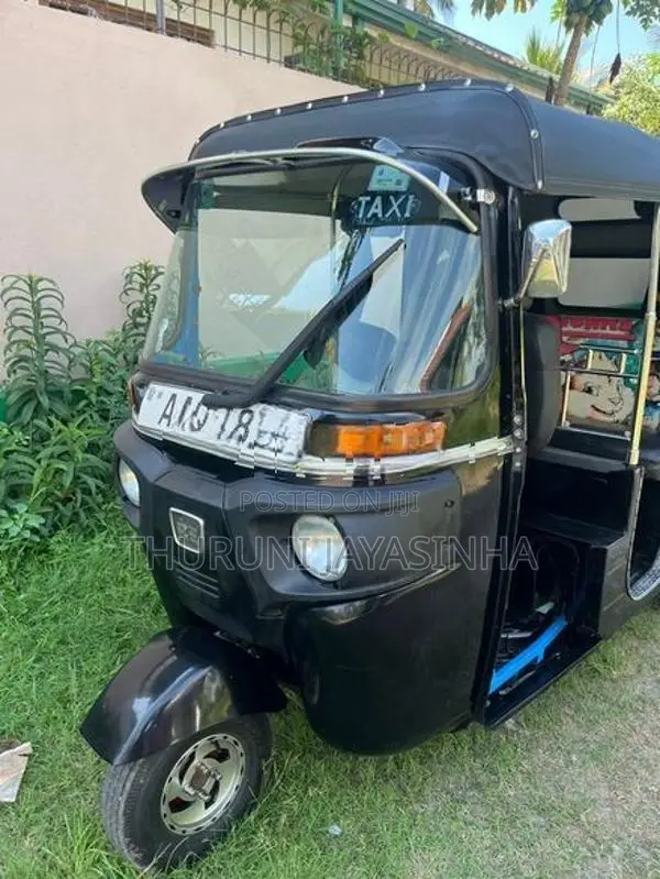 Bajaj RE 2014