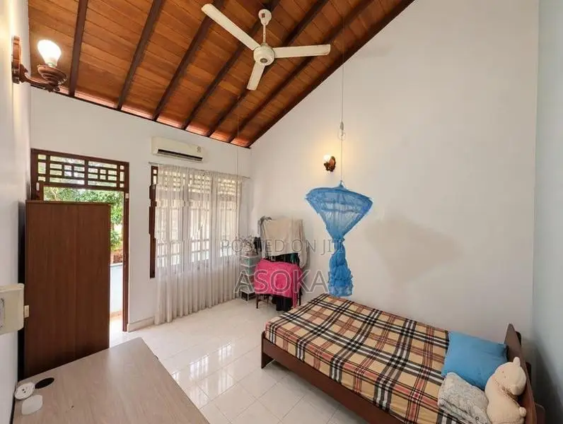 TWO STOREY HOUSE WITH 22 PERCHES