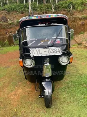 Bajaj RE 2011