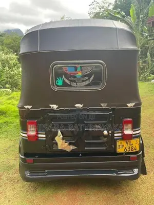 Bajaj RE 2011