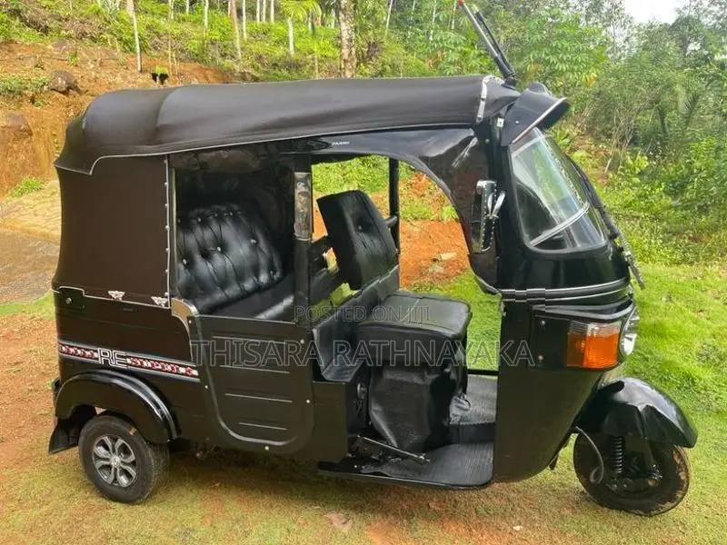 Bajaj RE 2011