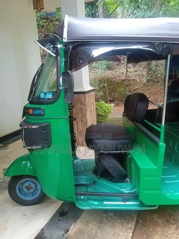 Bajaj RE 2014