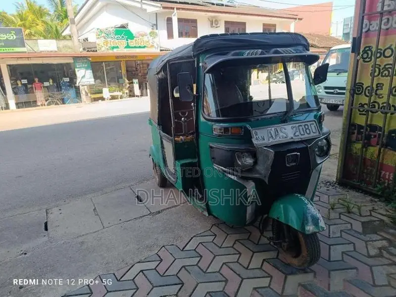 Bajaj RE 2014