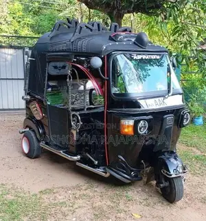 Bajaj RE 2013